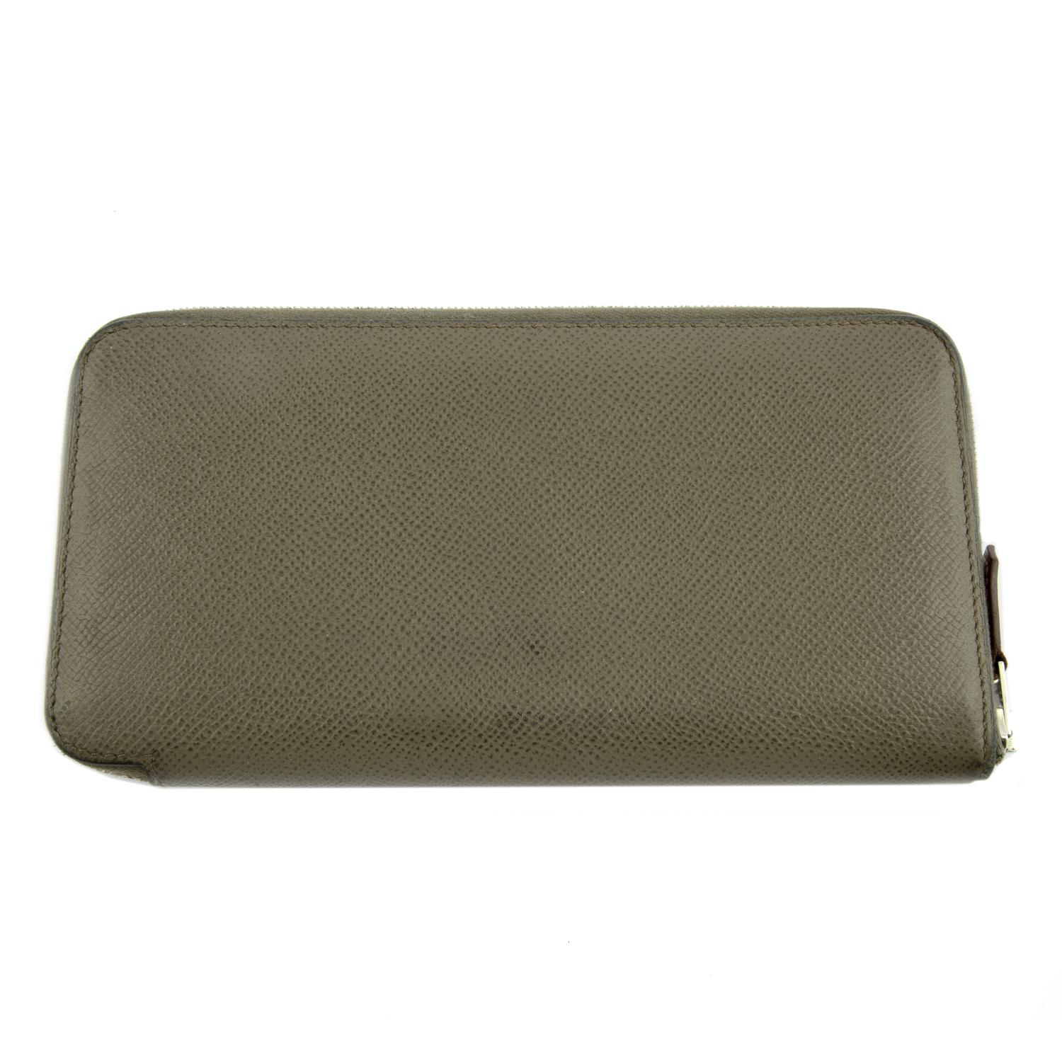HERMÈS - a brown leather Azap Silk Inn wallet.
