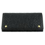 BURBERRY - a black leather monogram continental wallet.