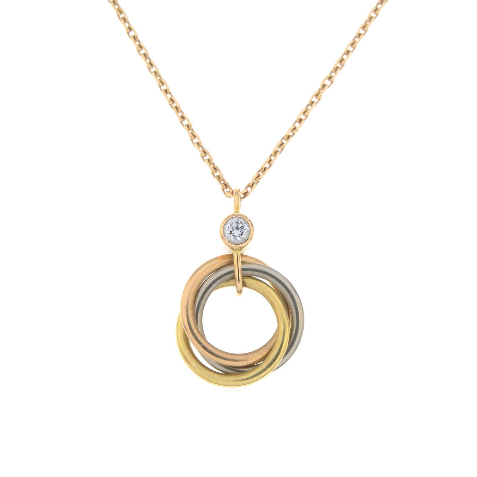 CARTIER - an 18ct gold diamond 'Trinity' pendant, on chain.