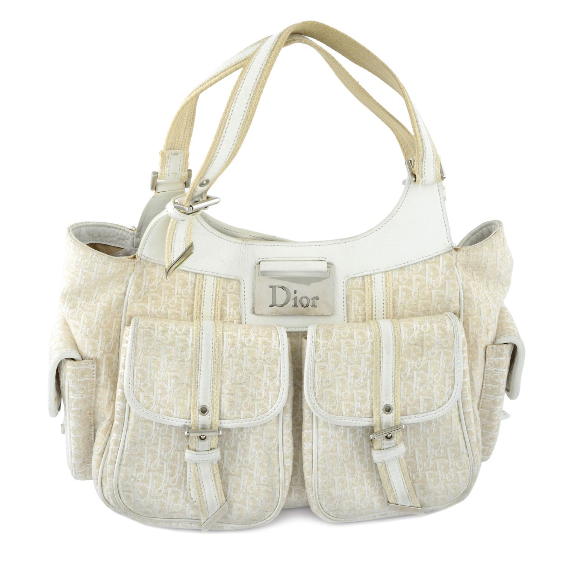 CHRISTIAN DIOR - a vintage white canvas Pocket handbag.