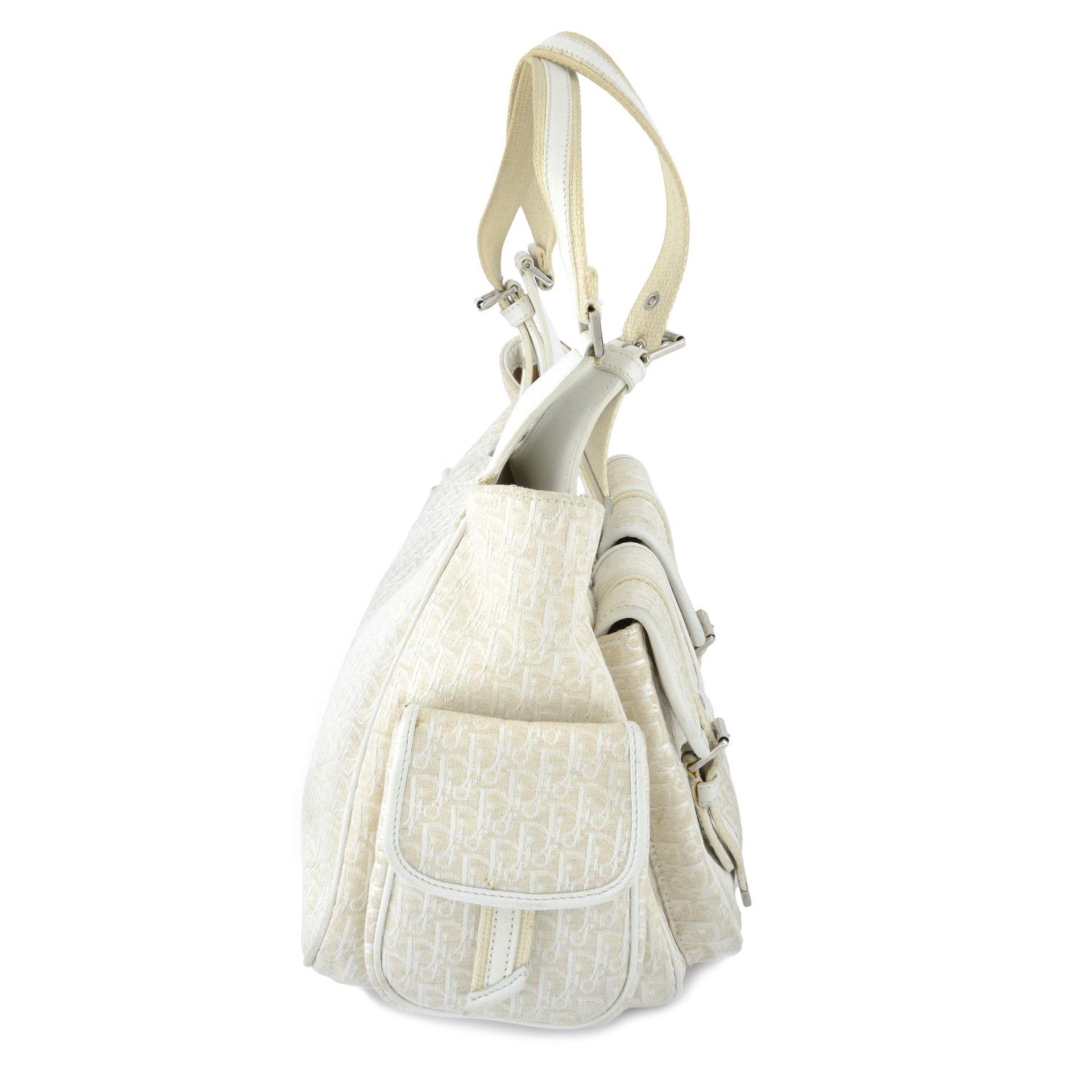 CHRISTIAN DIOR - a vintage white canvas Pocket handbag. - Image 3 of 5