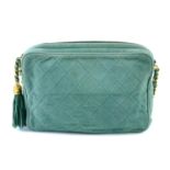 CHANEL - a green suede camera bag.