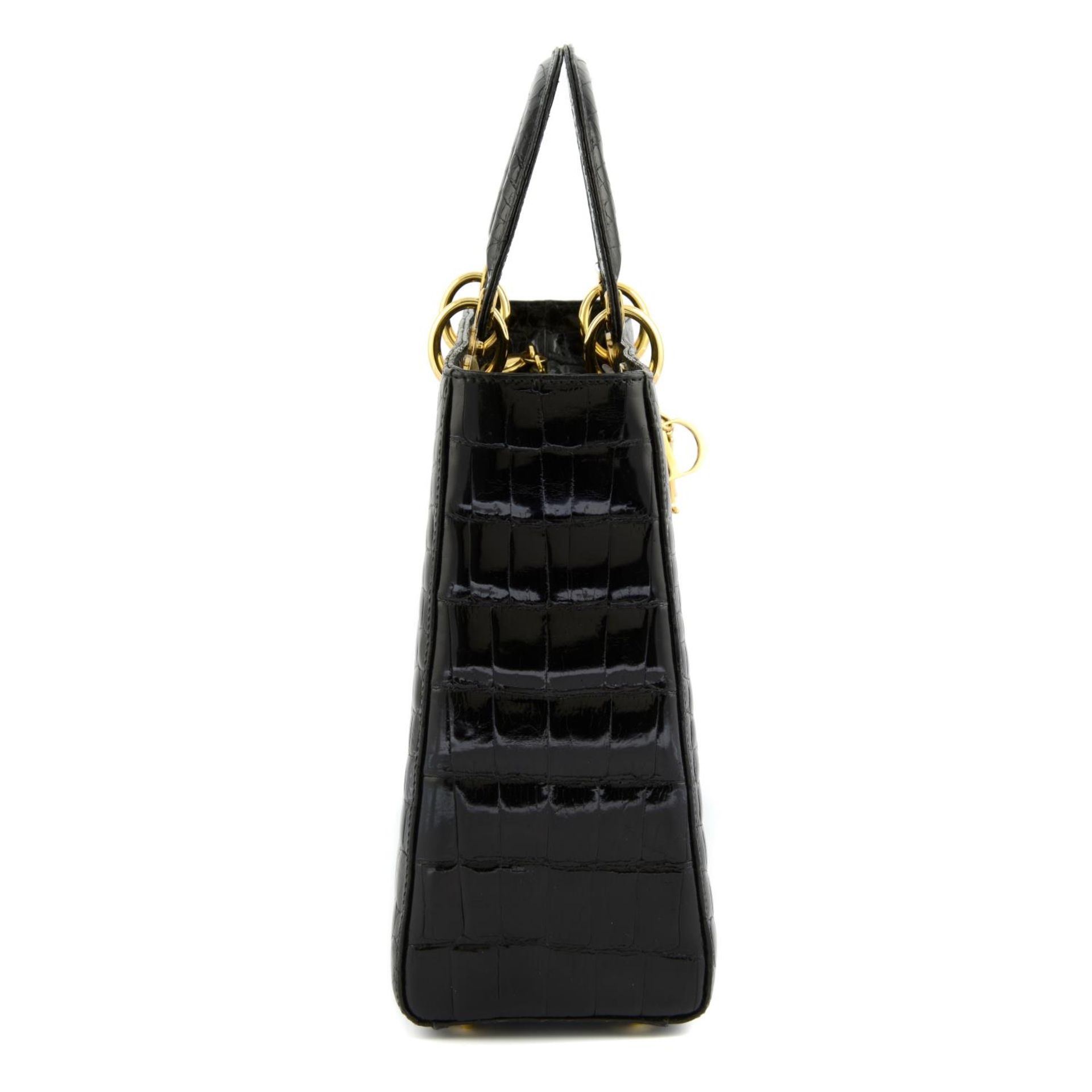 CHRISTIAN DIOR - a black crocodile Lady Dior handbag. - Image 4 of 5