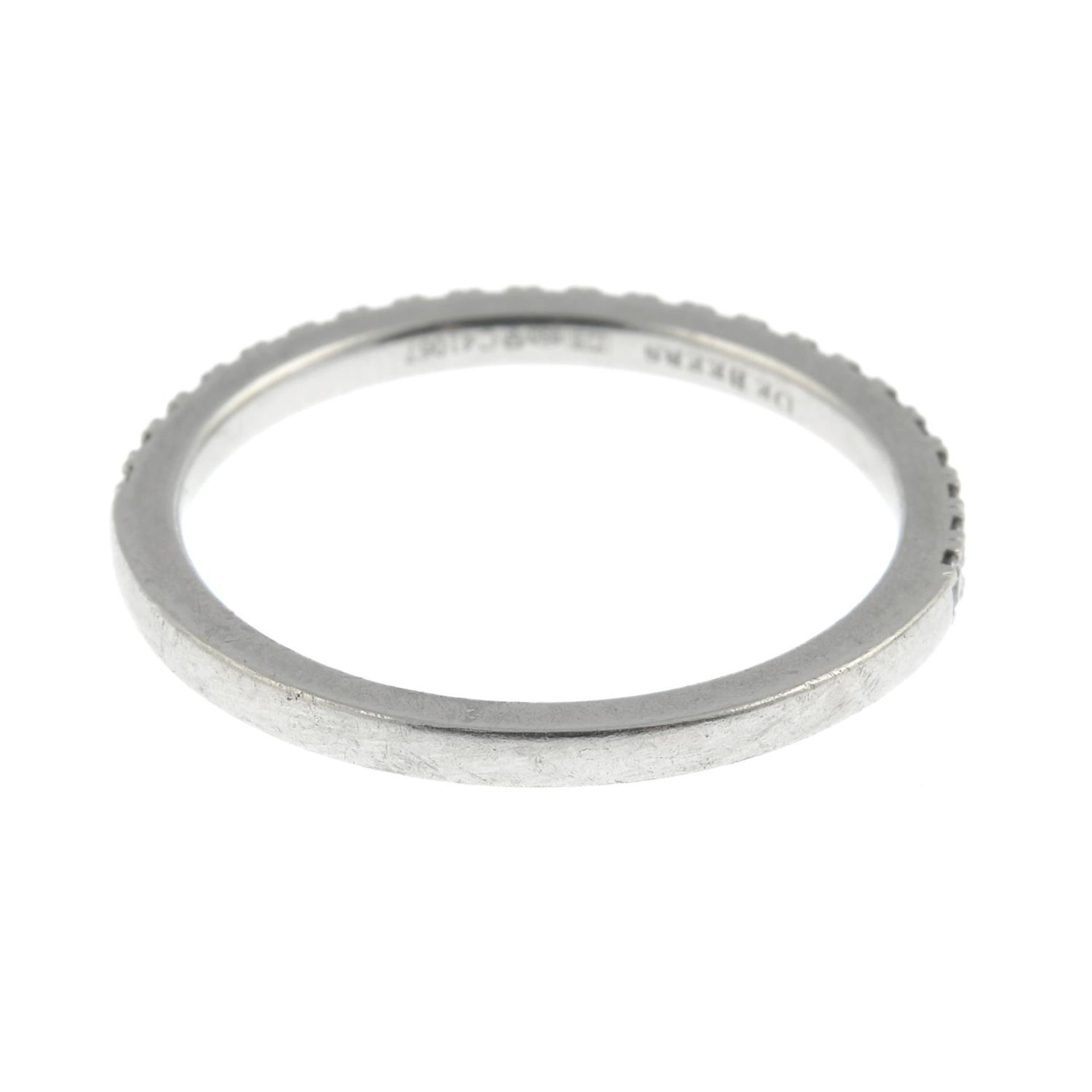 DE BEERS - a platinum brilliant-cut diamond 'DB Classic' half eternity ring. - Image 3 of 7