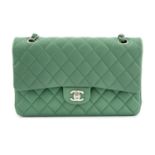 CHANEL - a green medium classic double flap handbag.