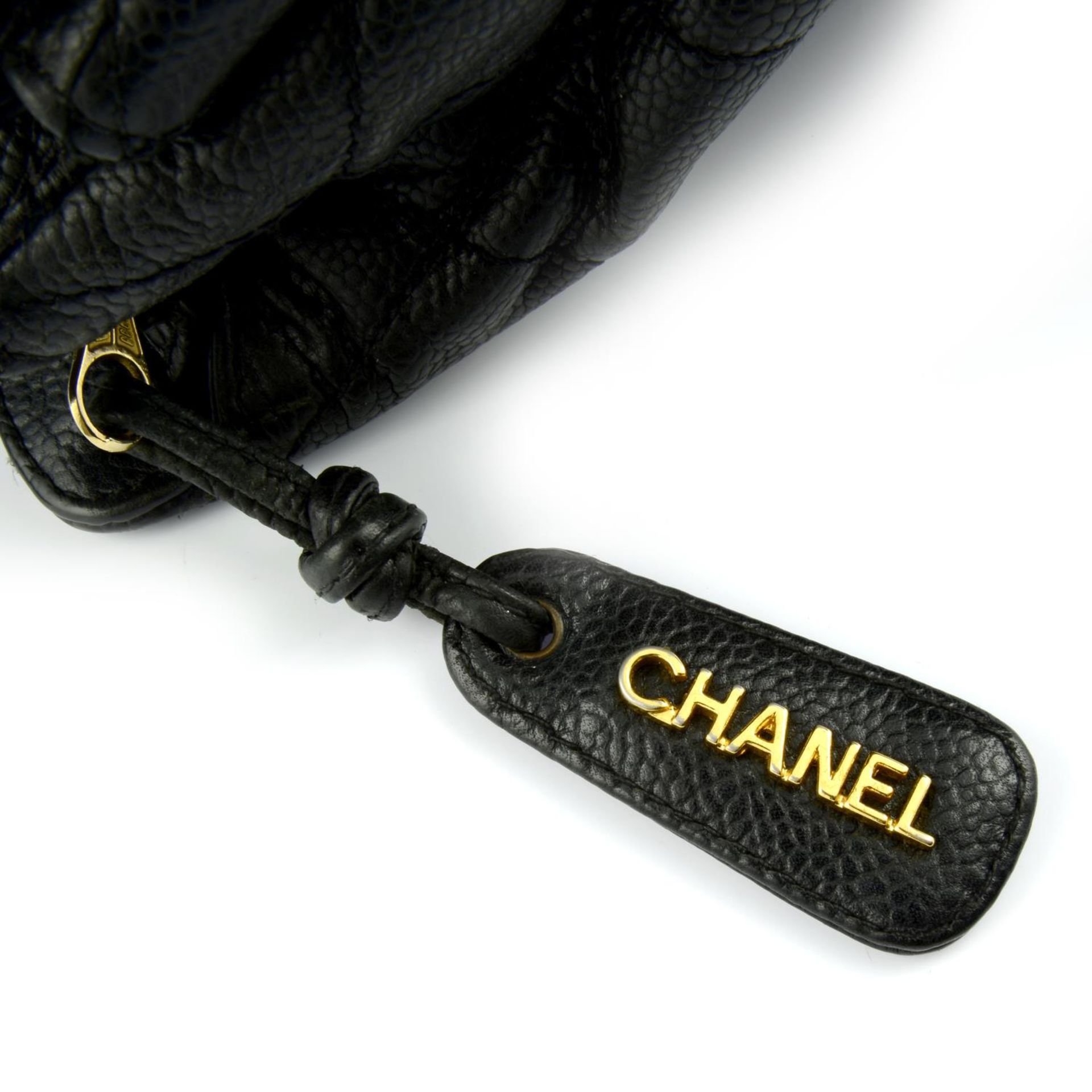 CHANEL - a vintage black caviar leather Petite Shopping Tote handbag. - Image 6 of 6