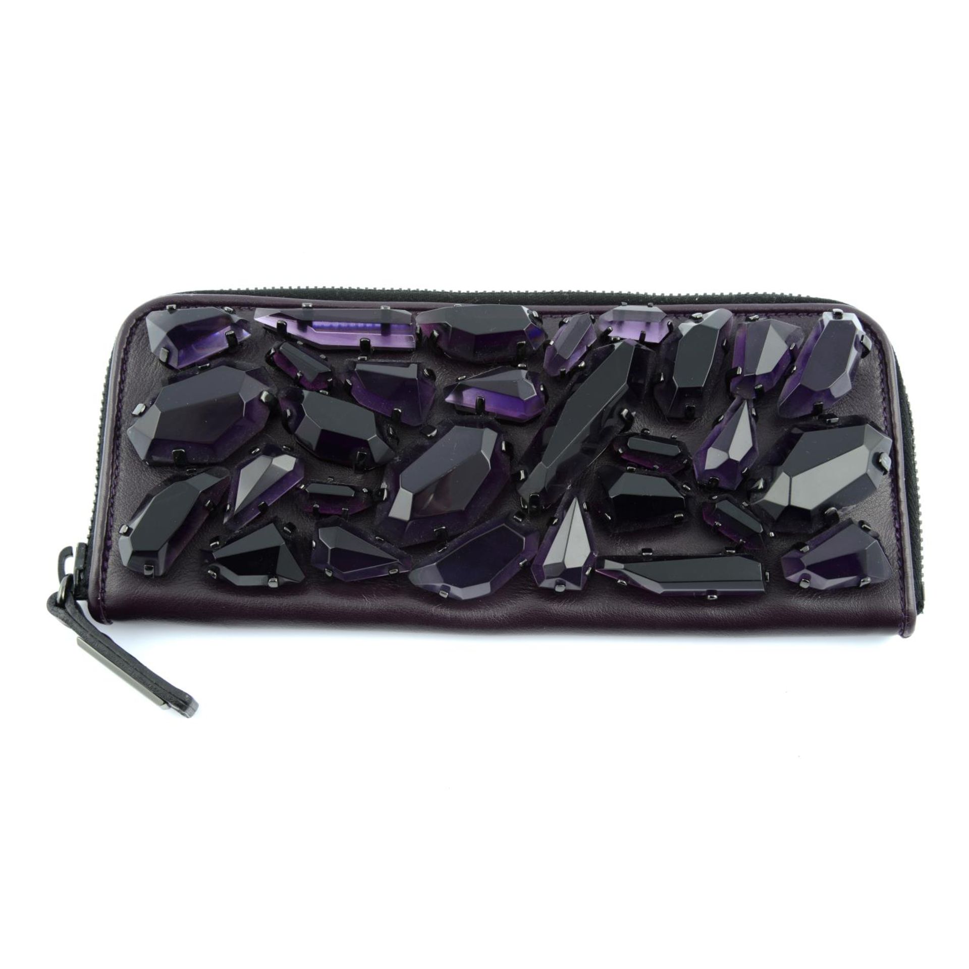 BURBERRY - a Runway embellished zip clutch.