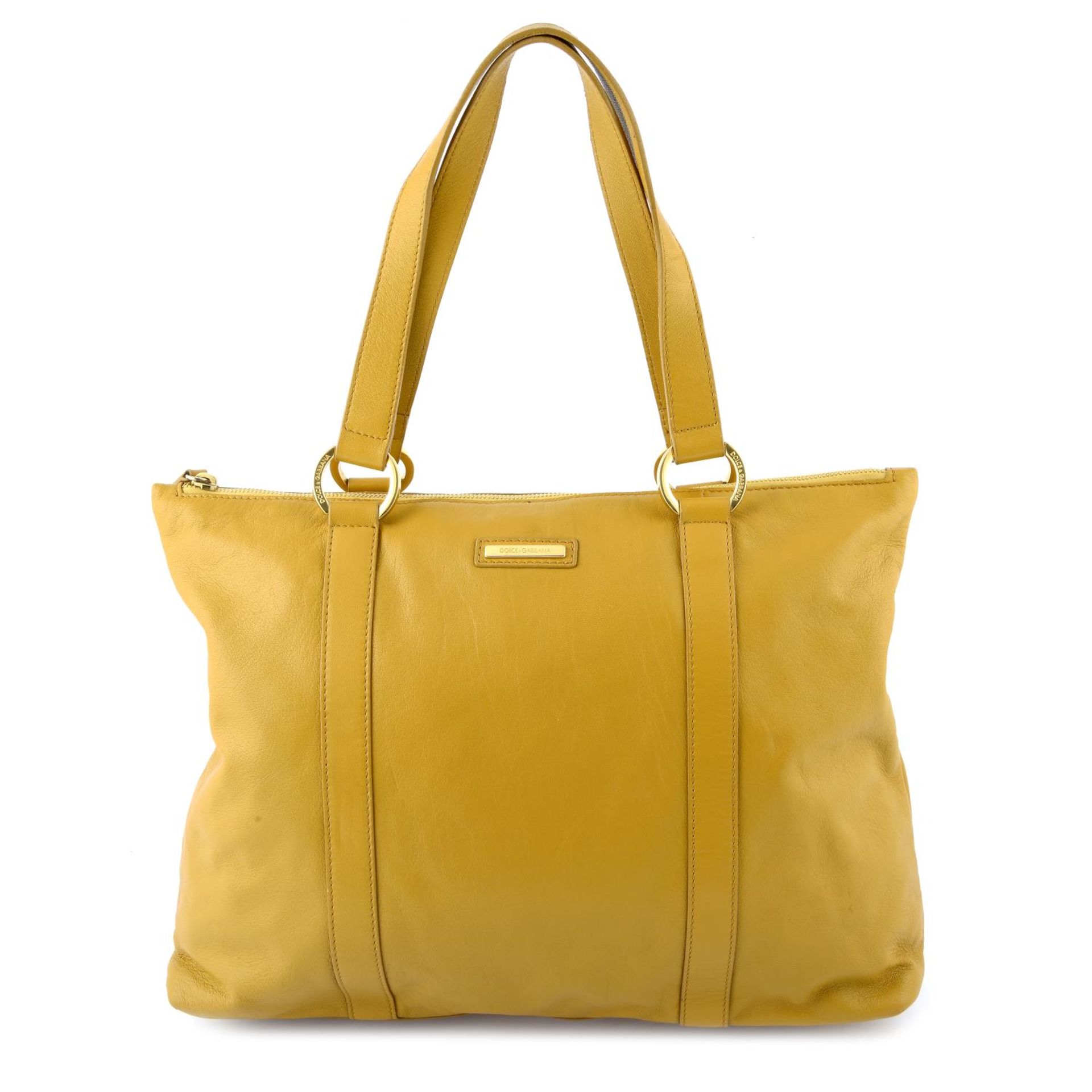 DOLCE & GABBANA - a mustard yellow leather handbag.