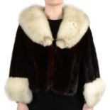 A mink and fox fur trim cape.