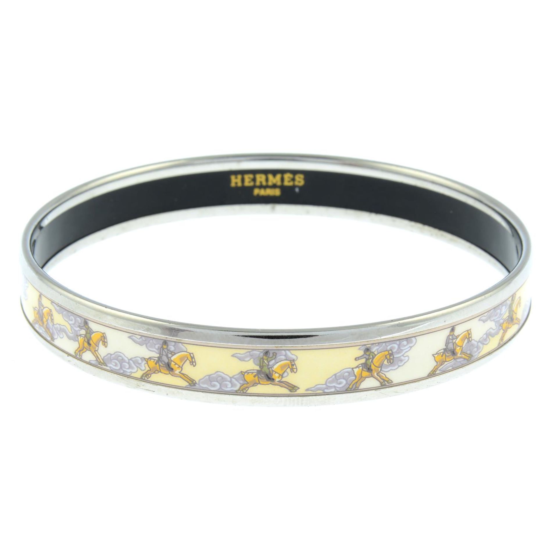 HERMÈS - a horse motif enamel bangle.