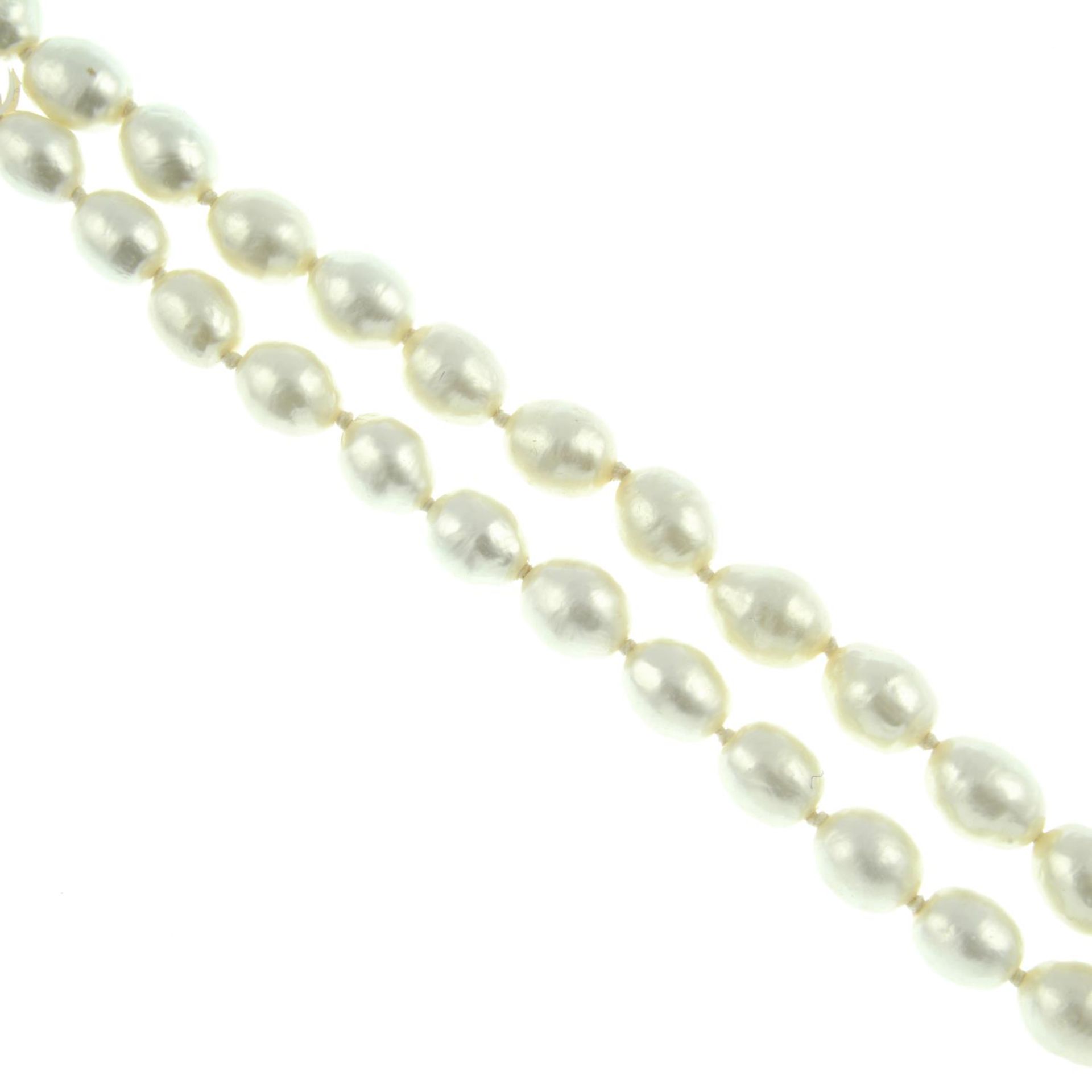 CHANEL - an imitation pearl necklace.