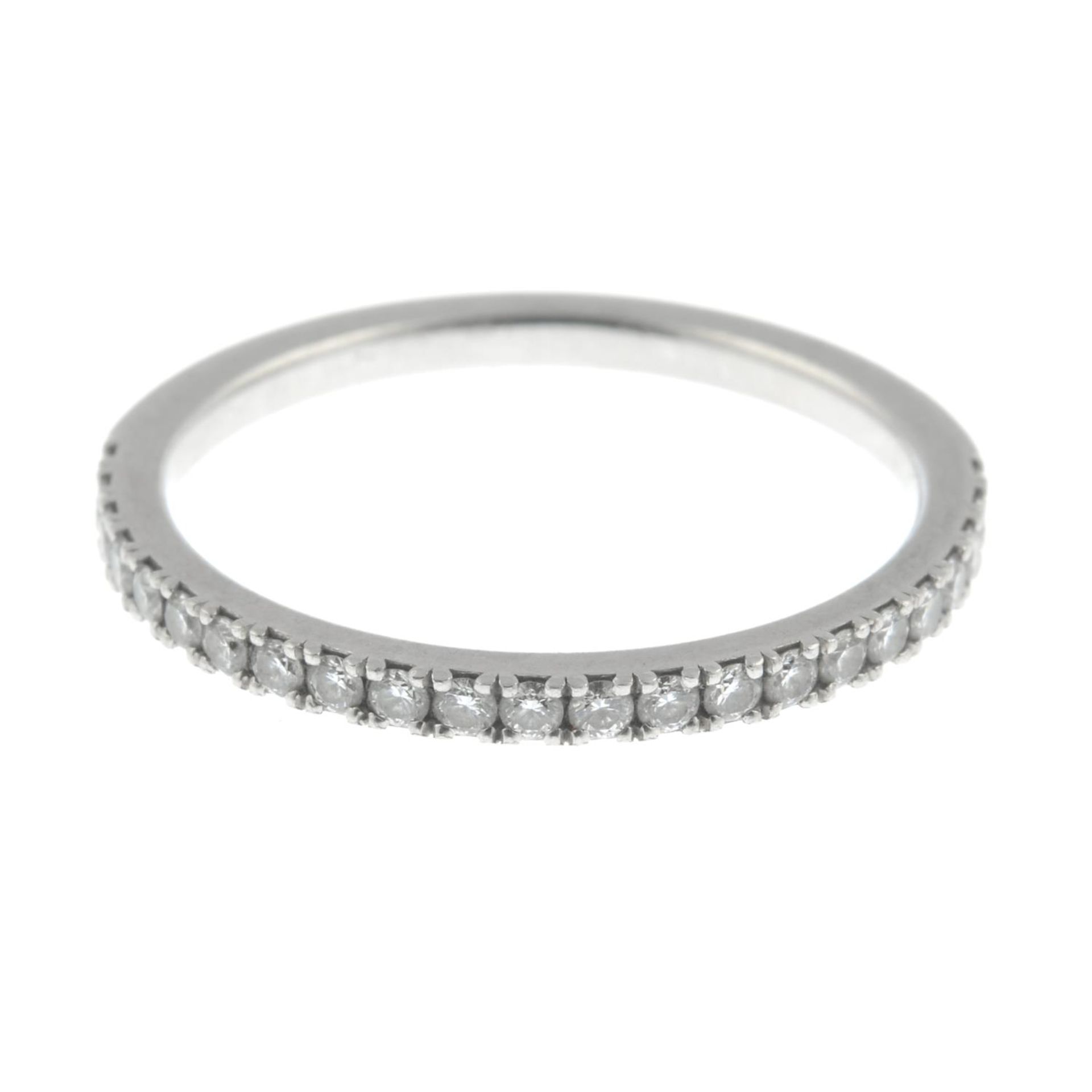 DE BEERS - a platinum brilliant-cut diamond 'DB Classic' half eternity ring. - Image 2 of 7