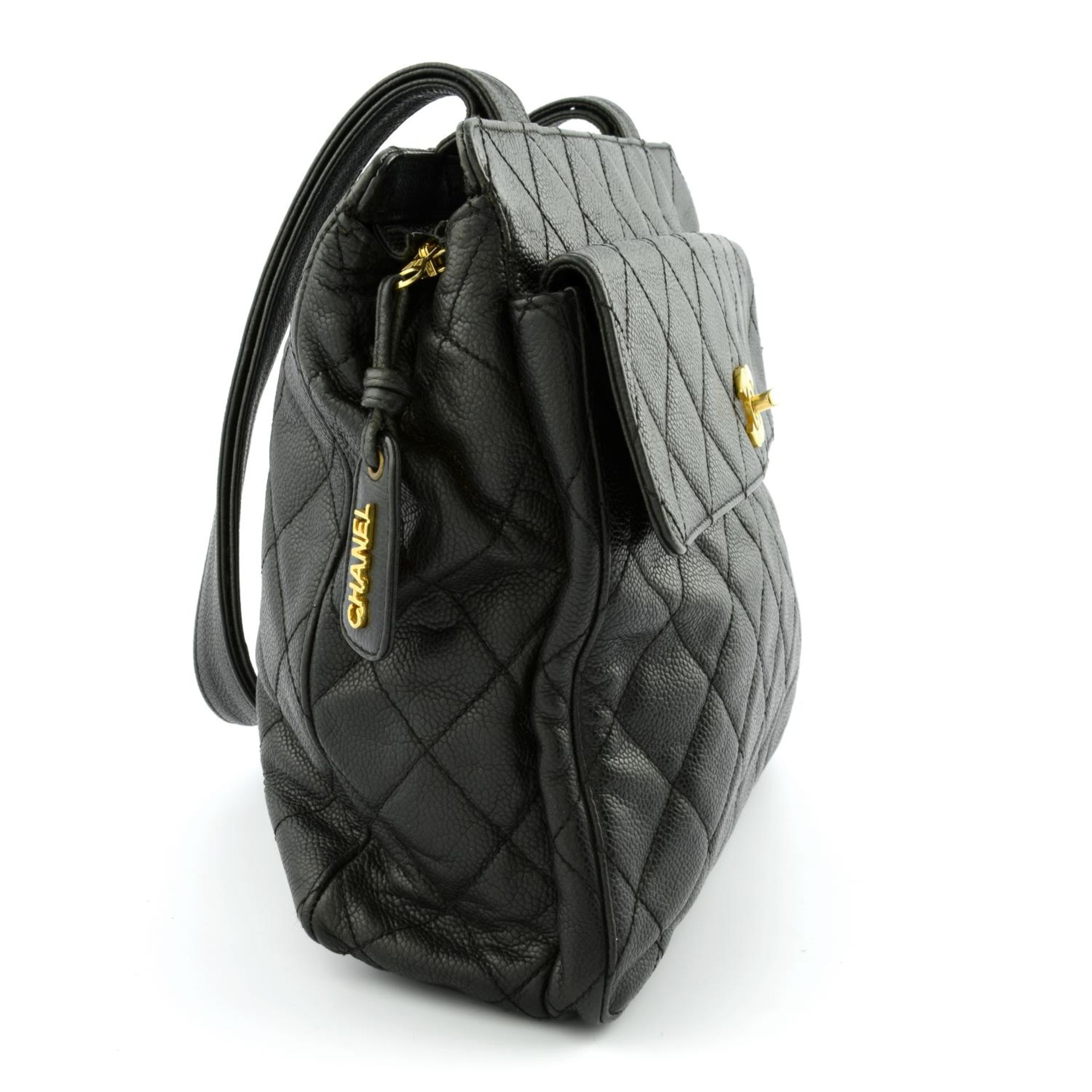 CHANEL - a vintage black caviar leather Petite Shopping Tote handbag. - Image 4 of 6