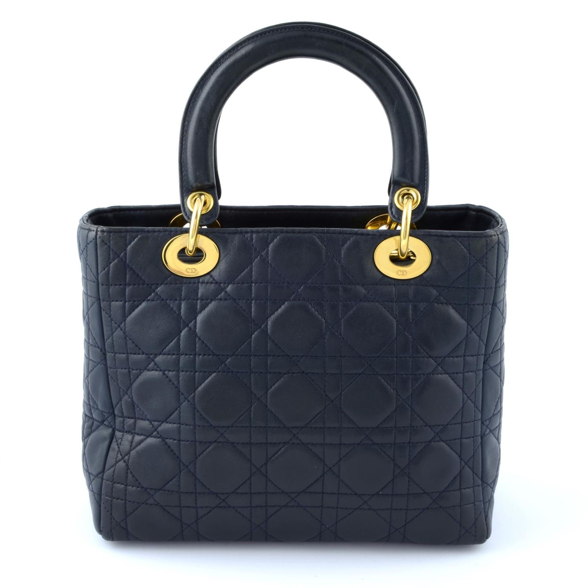 CHRSITIAN DIOR - a navy leather soft body Lady Dior handbag. - Image 2 of 5