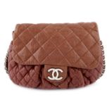 CHANEL - a quilted lambskin leather chain around handbag.