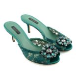 DOLCE & GABBANA - a pair of green lace embellished sandals.