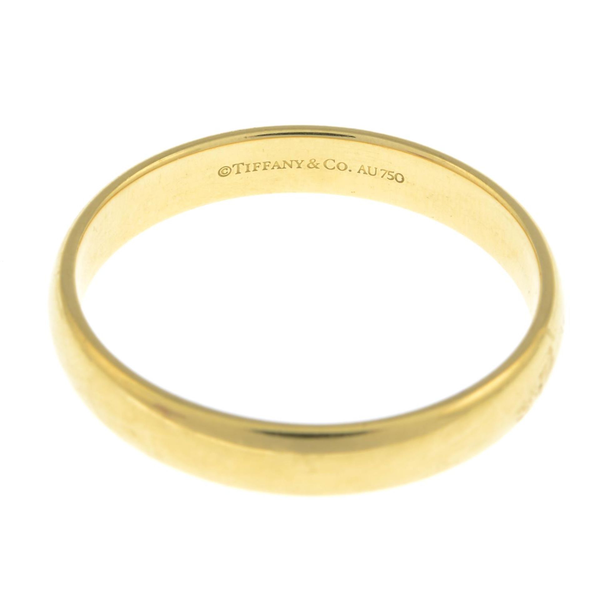 TIFFANY & CO. - an 18ct gold band ring. - Image 3 of 3