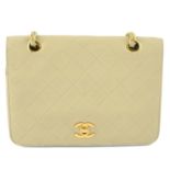 CHANEL - a nude vintage single flap handbag.