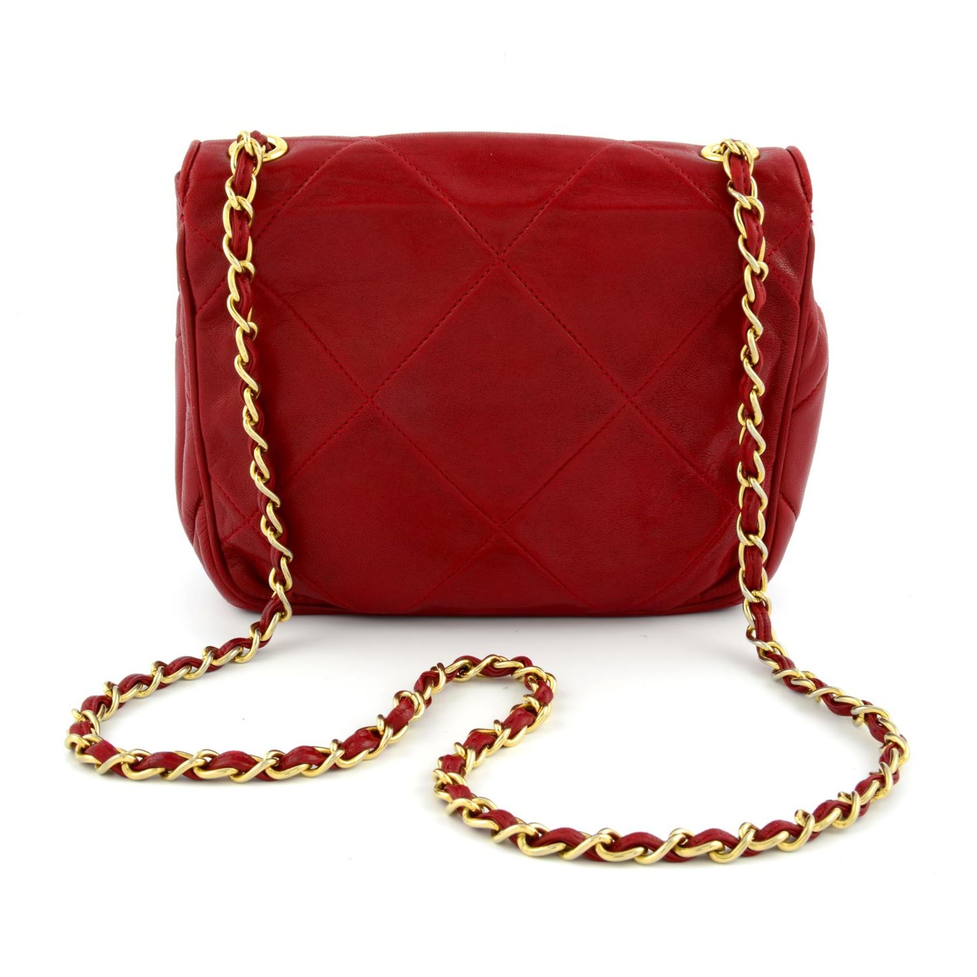 CHANEL - a red leather flap crossbody handbag. - Image 2 of 6