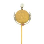 An Art Nouveau gold ruby, diamond and seed pearl stickpin.Length of stickpin head 2.2cms.