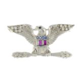 A sapphire, ruby and diamond American flag eagle brooch.Estimated total diamond weight