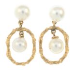 A pair of cultured pearl drop earrings.Length 2.3cms.