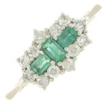 An 18ct gold emerald and diamond dress ring.Total emerald weight 0.26ct,