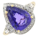 An 18ct gold tanzanite and diamond dress ring.Estimated total diamond weight 0.10ct.