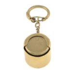 A 9ct gold key ring, suspending a 9ct gold sovereign holder.Hallmarks for 9ct gold.