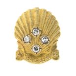 A 9ct gold and diamond dress stud awarded for 40 years of service at Shell.Estimated diamond total
