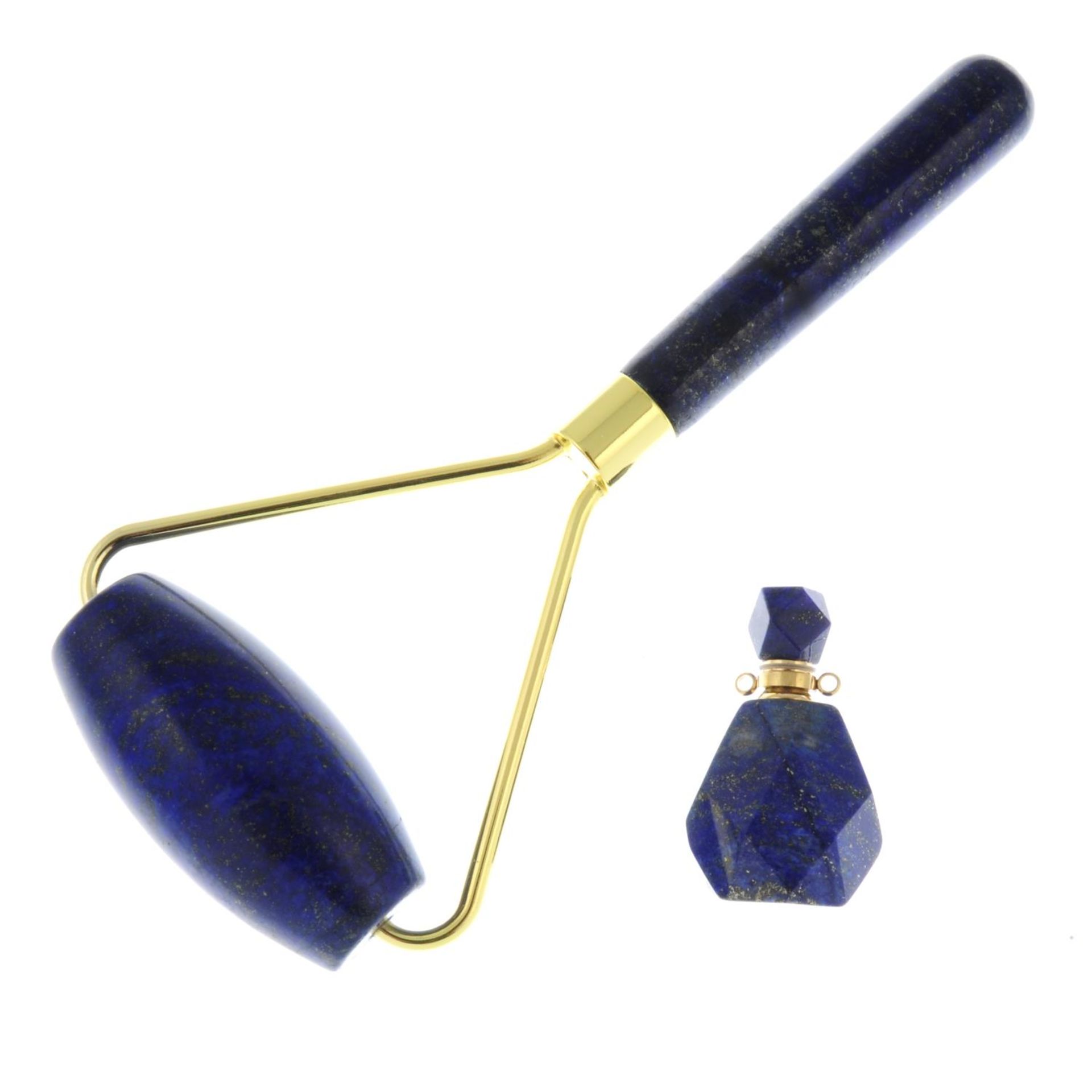 A lapis lazuli scent bottle pendant and face roller.Length of scent bottle 3.5cms.