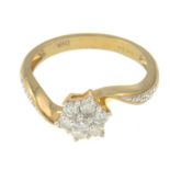 A 9ct gold diamond cluster ring.Estimated total diamond weight 0.32cts.Hallmarks for London.Ring