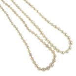 Nine cultured pearl necklaces, one with a diamond set clasp.Six stamped 375.