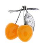 A silver amber brooch of cherries,