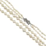 Three two row cultured pearl necklaces,