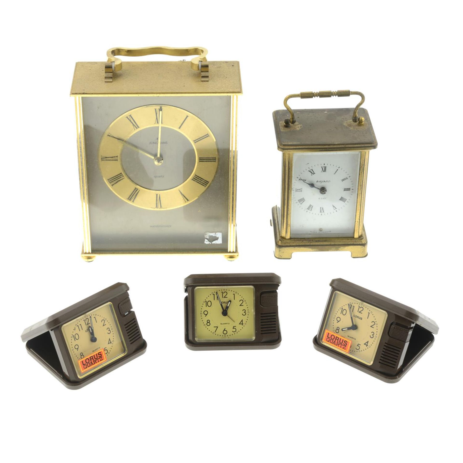 A group of assorted carriage and travel alarm clocks, to include examples by Lorus.