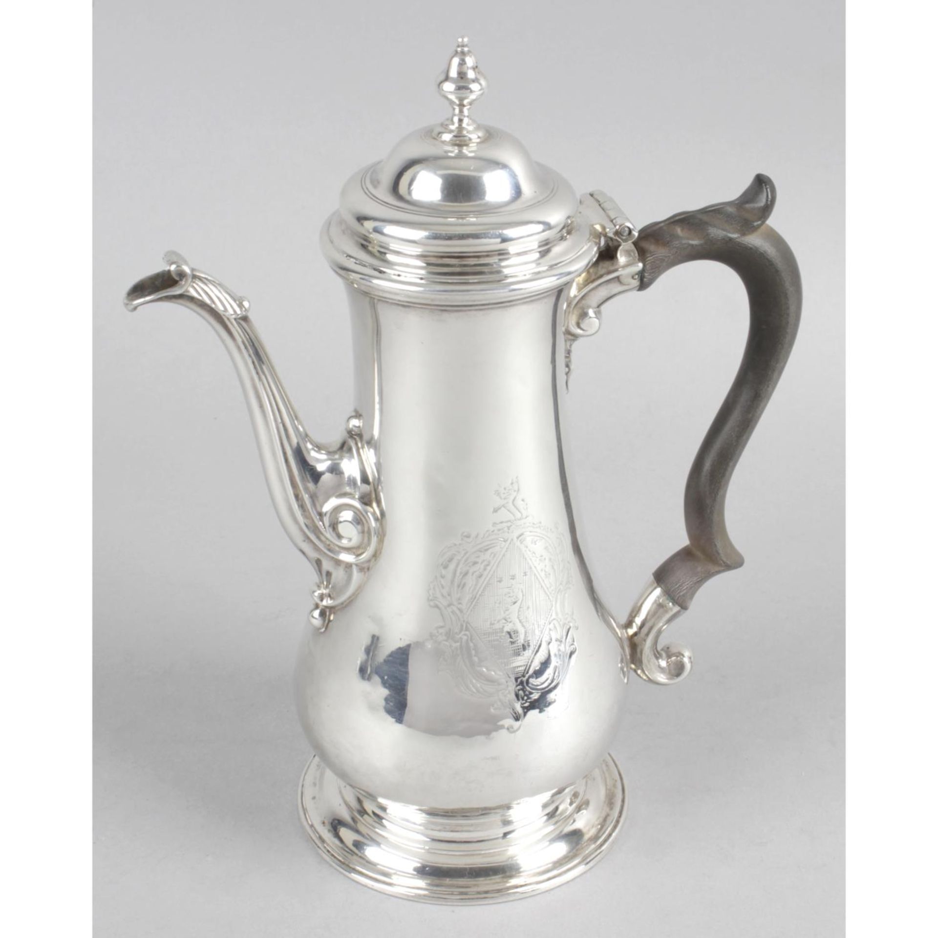An early George III silver coffee pot,