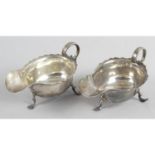 A pair of Edwardian Britannia silver sauce boats,