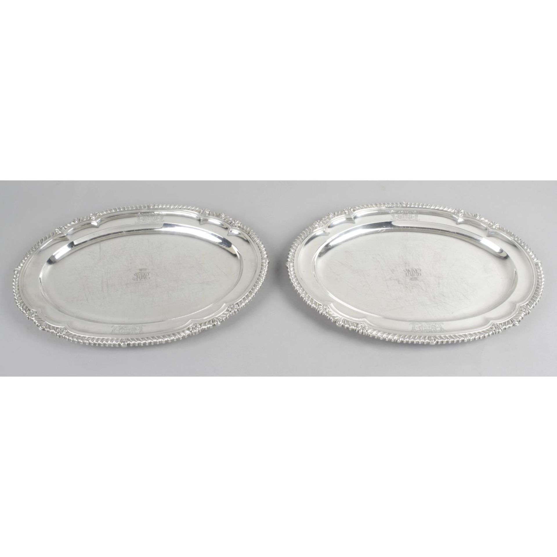 A pair of late George III silver meat dishes by Paul Storr,