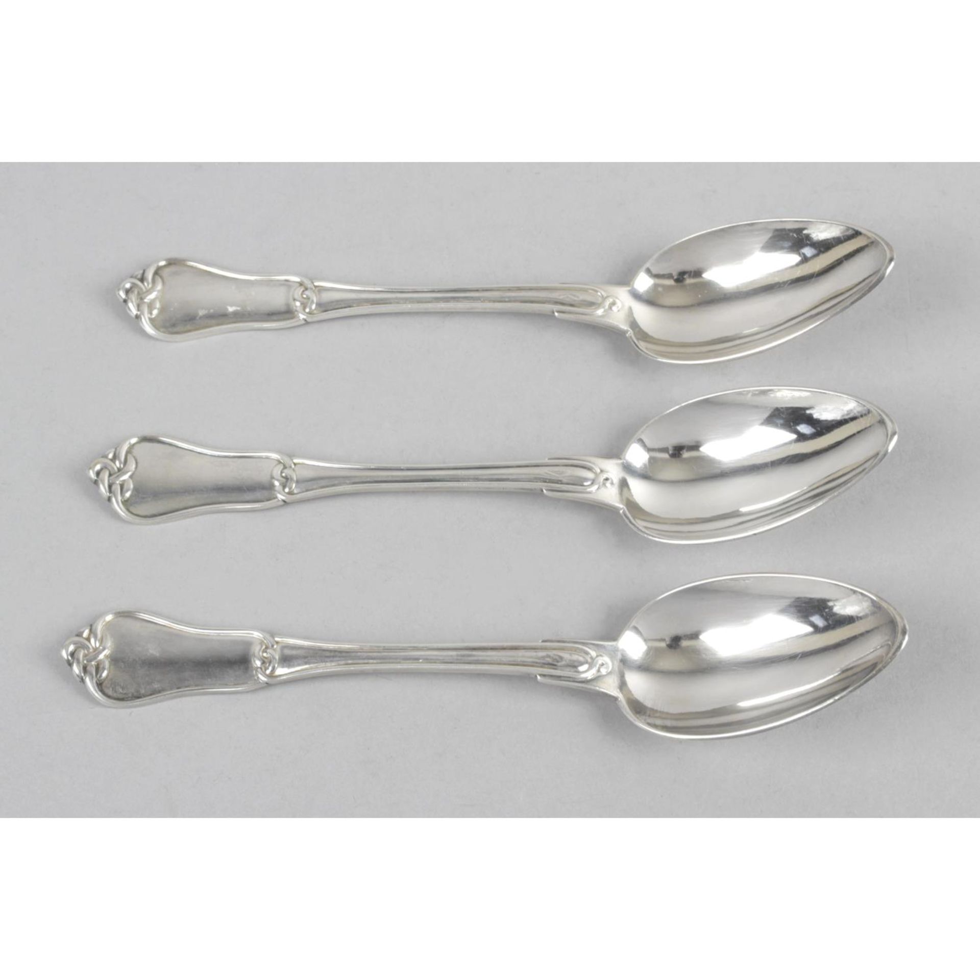 Three 19th century French silver table spoons,