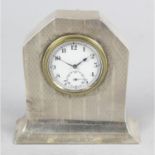 A 1920's silver mounted desk clock,