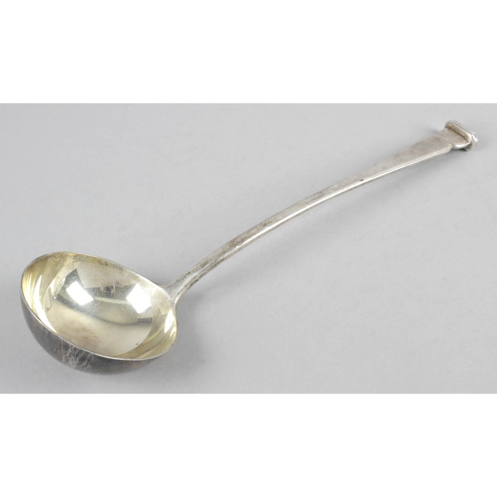 A George V silver soup ladle,