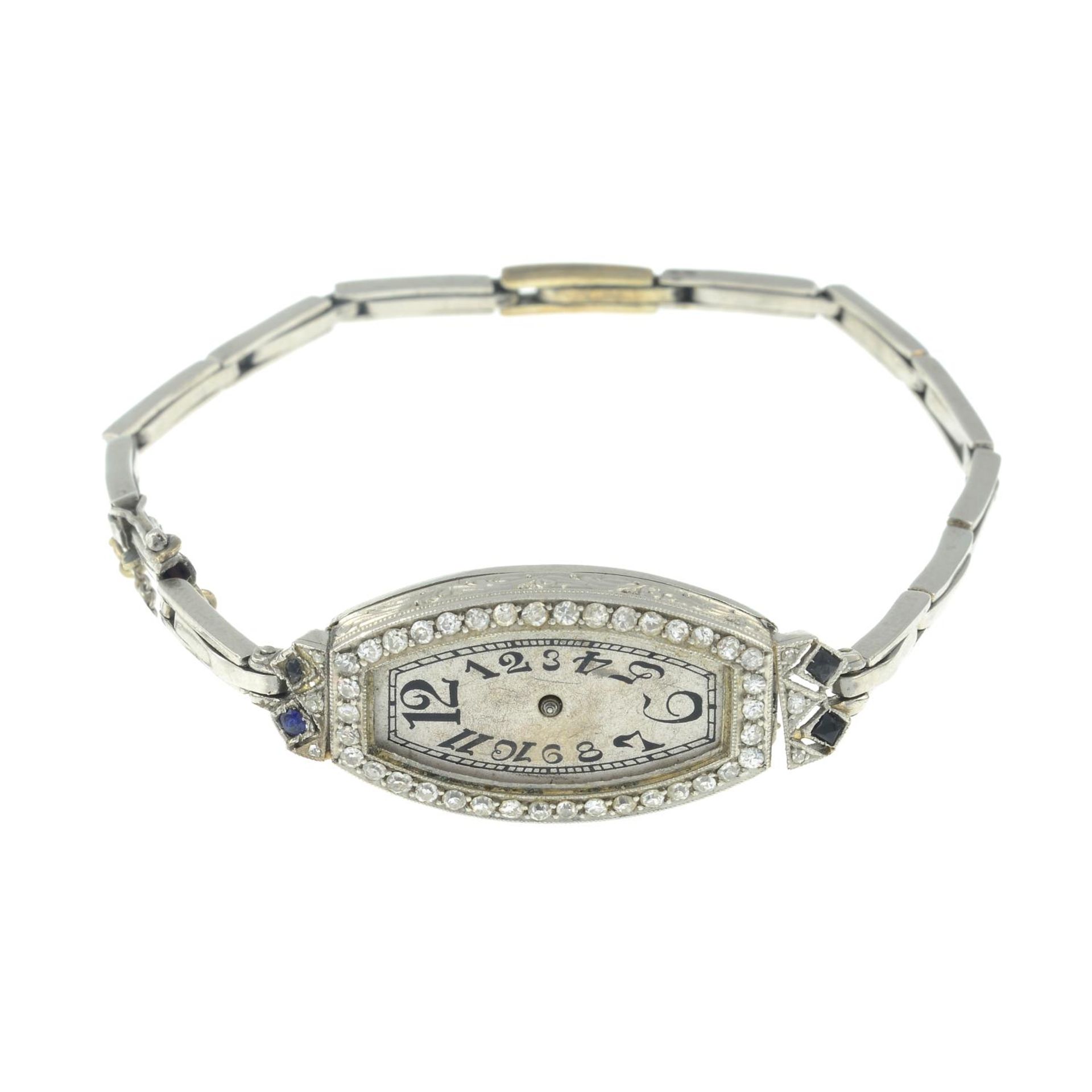 A lady's early 20th century platinum diamond cocktail watch.
