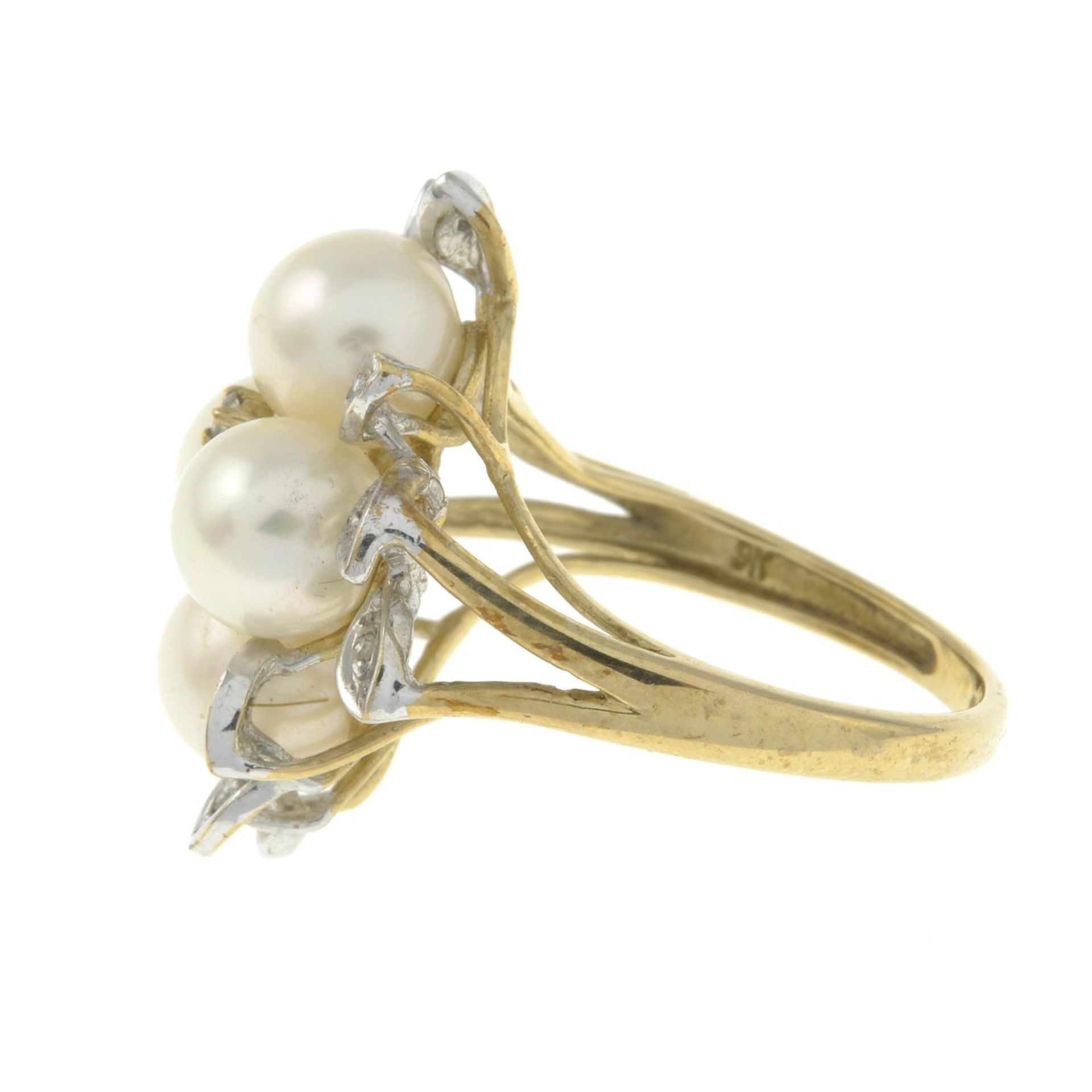 A 9ct gold cultured pearl and diamond floral dress ring.Hallmarks for 9ct gold. - Image 3 of 3