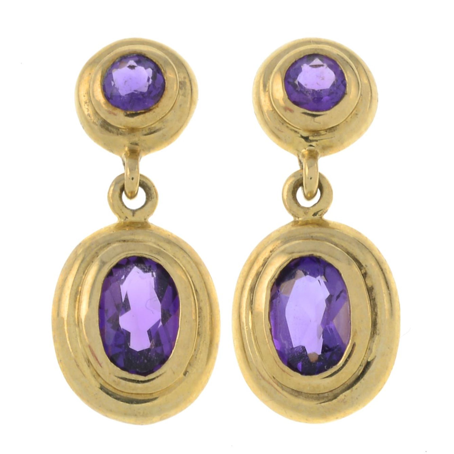 A pair of 9ct gold amethyst earrings.Import marks for Birmingham.Length 1.9cms.