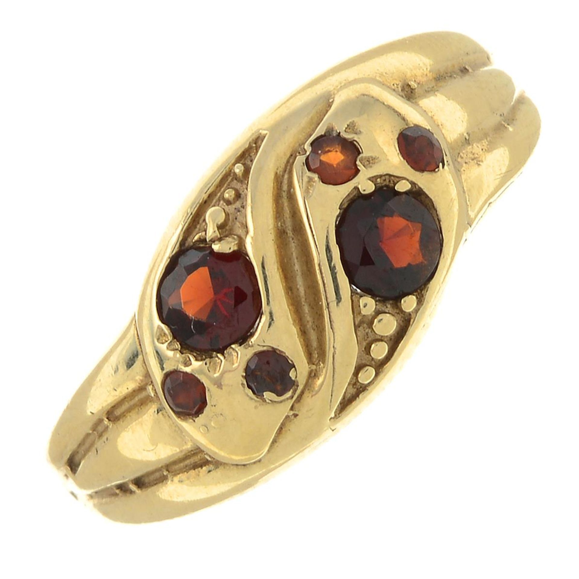 A 9ct gold garnet double snake ring.Hallmarks for 9ct gold.