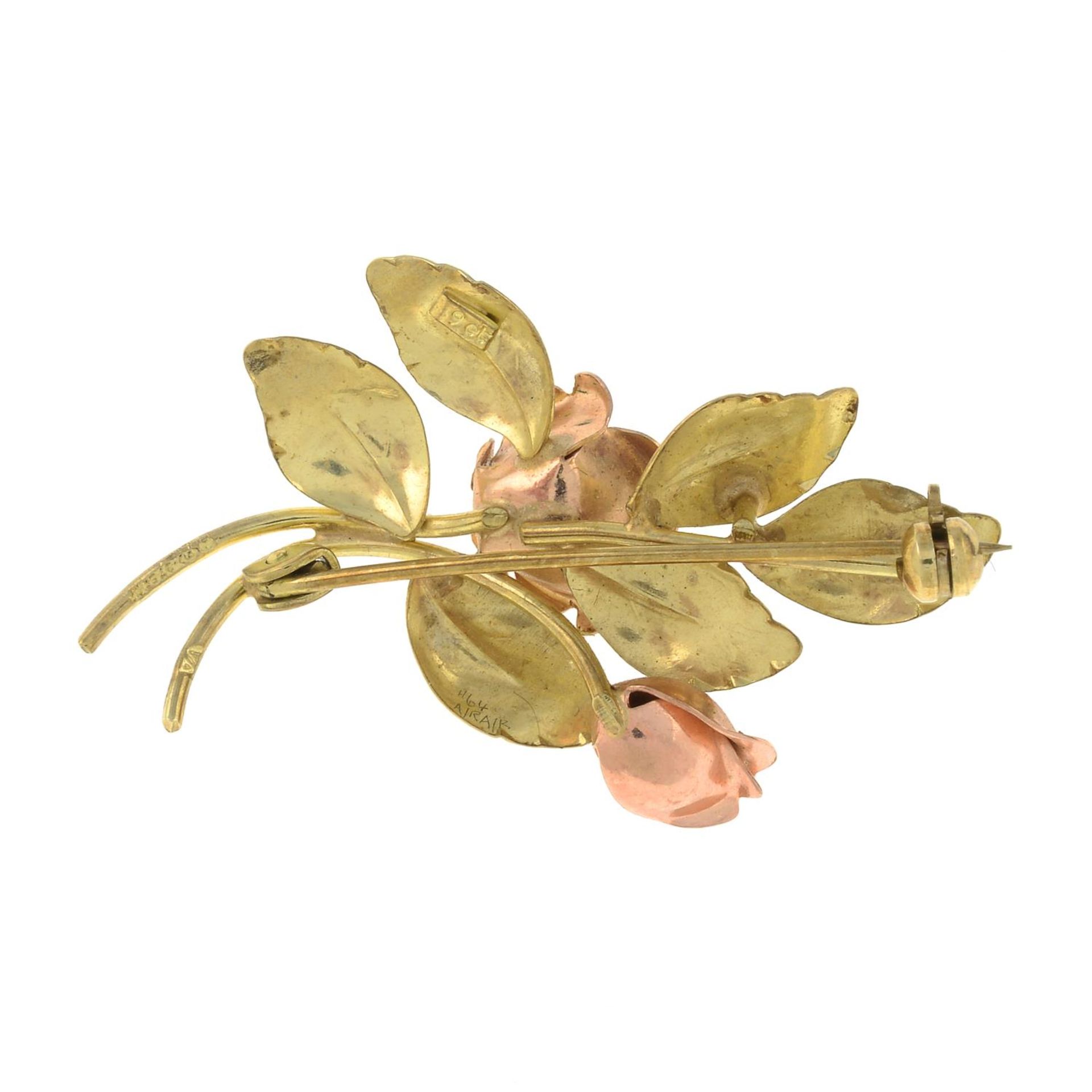 A bi-colour floral brooch.Stamped 9ct.Length 4cms. - Image 2 of 2