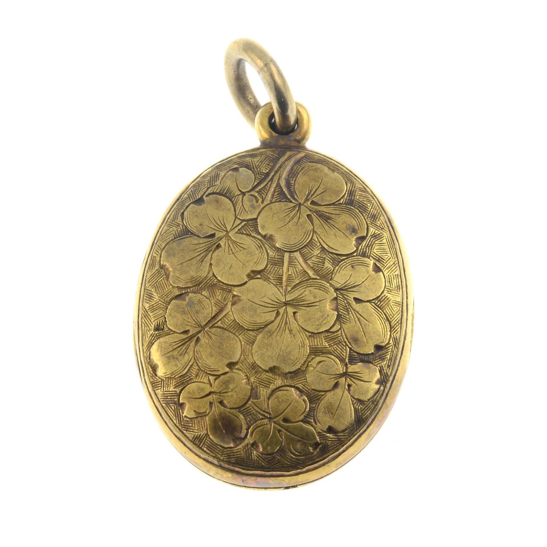A late 19th century gold shamrock engraved locket pendant.Length 3.3cms. - Bild 2 aus 2