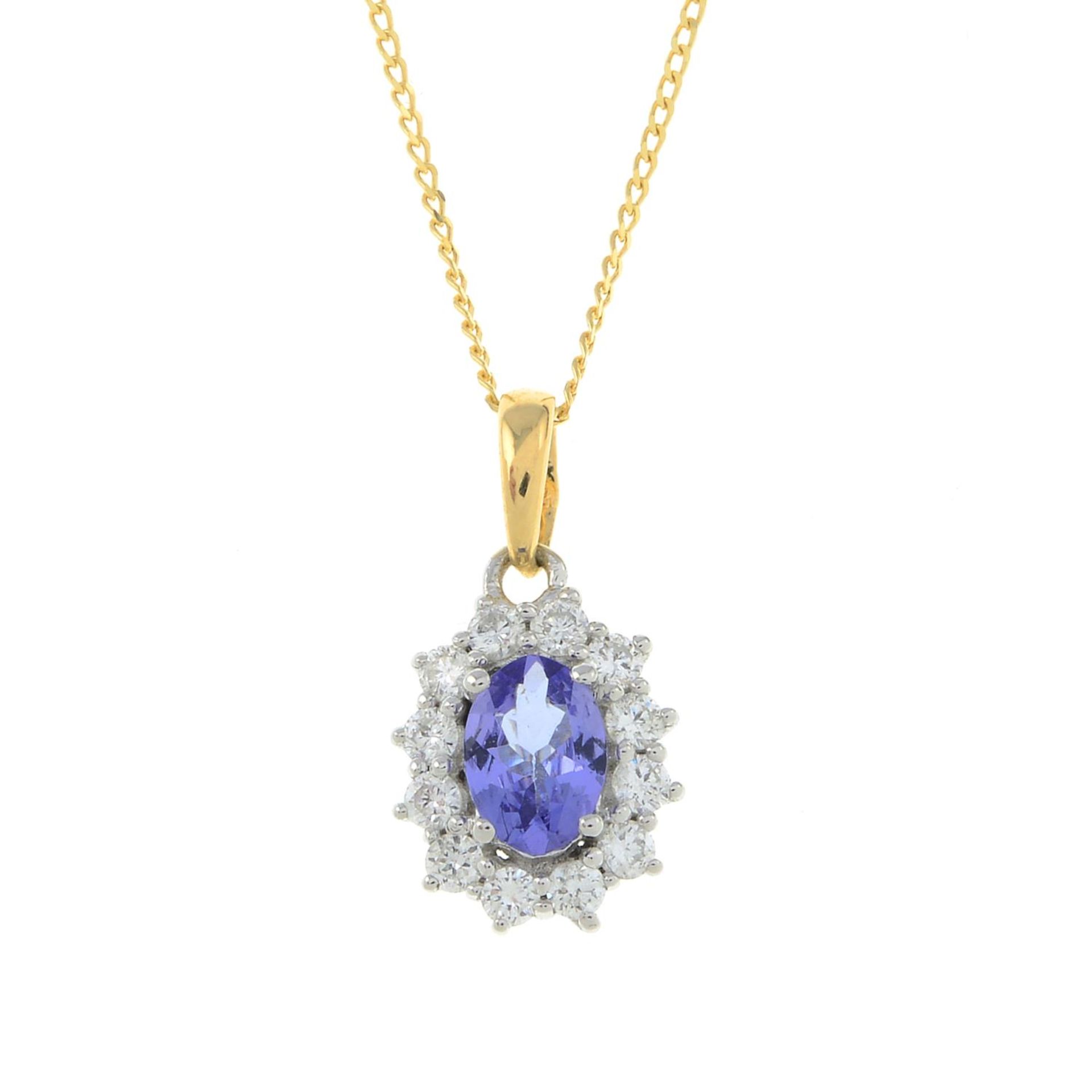 An 18ct gold tanzanite and diamond pendant, with chain.Tanzanite weight 0.36ct.