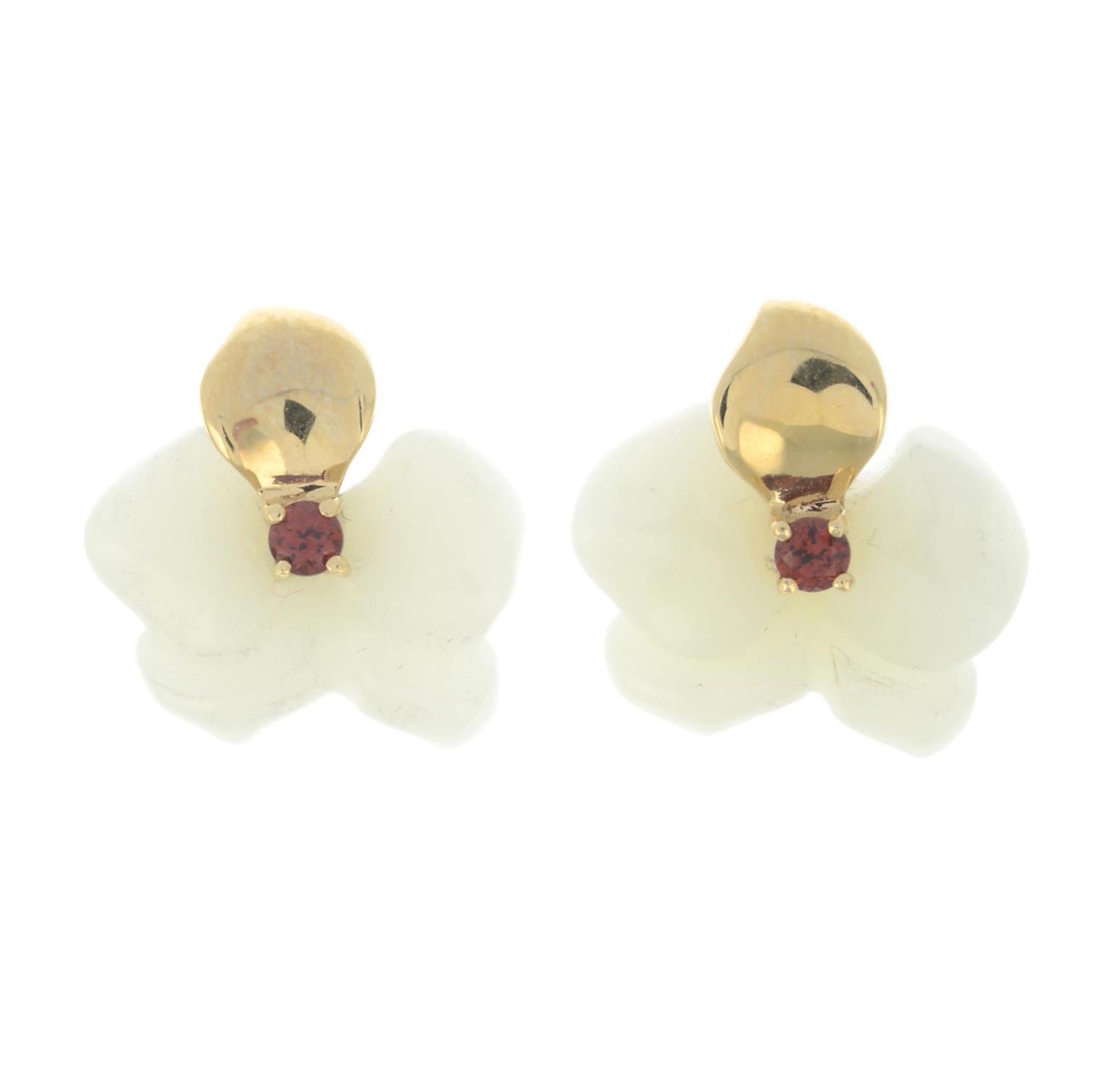 A pair of carved white nephrite and garnet floral earrings,